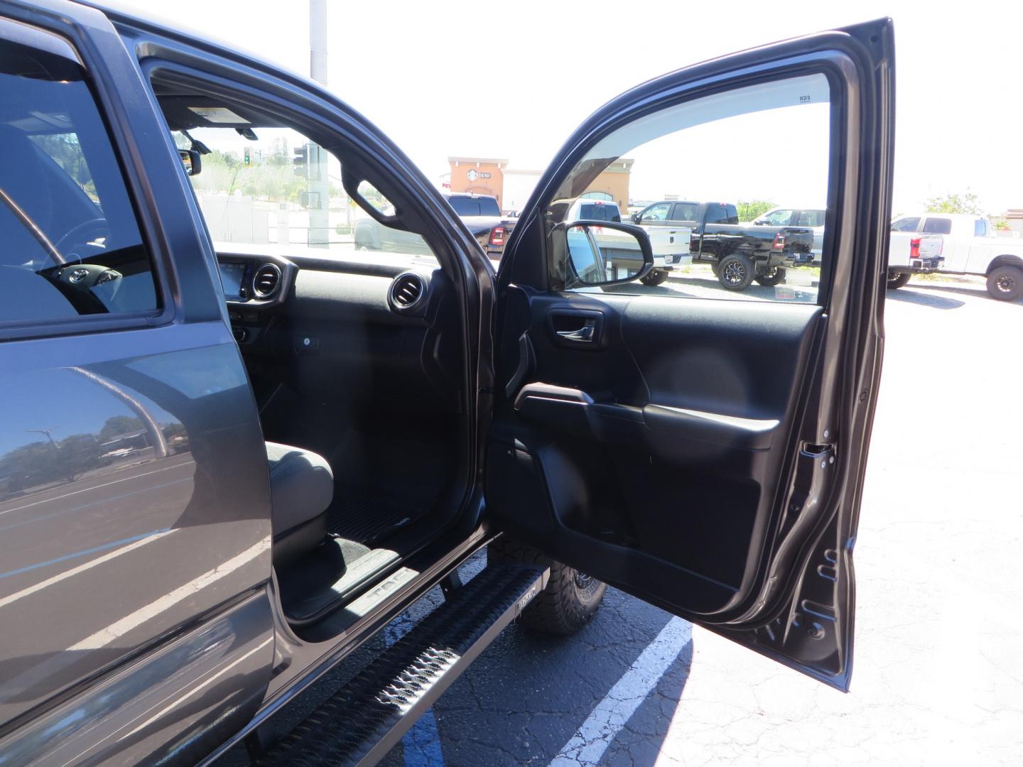 2017 CHARCOAL /GREY Toyota Tacoma TRD OFF-ROAD Double Cab Long Bed V6 6AT 4WD (3TMDZ5BN3HM) with an 3.5L V6 engine, automatic transmission, located at 2630 Grass Valley Highway, Auburn, CA, 95603, (530) 508-5100, 38.937893, -121.095482 - TRD Off-road Tacoma with a level kit, 17" Fuel Vector wheels, Falken Wildpeak AT tires, N-Fab running boards, Roll Up tonneau cover, BedRug, and window Deflectors. - Photo#40